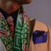 编辑林知远的职业形象照，戴眼镜穿深色衬衫，表情专注沉稳